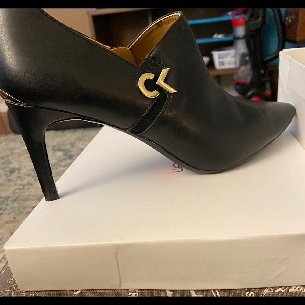 BRAND NEW/Calvin Klein booties w/gold trim! In original box!